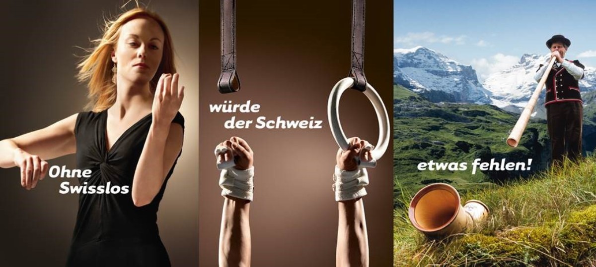 Auftrag der Swisslos Ohne Swisslos würde der Schweiz etwas fehlen: Geigerin ohne Geige, Ringer mit nur einem Ring und Alphornbläser mit defektem Alphorn.